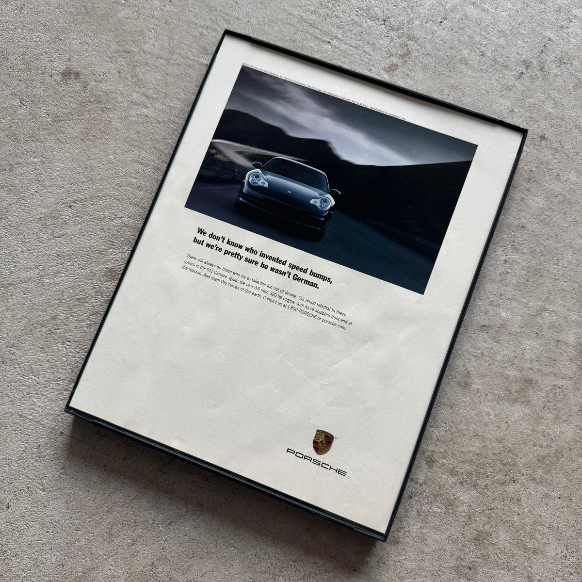 2001 Porsche Who Invented Speedbumps Framed Advertisement